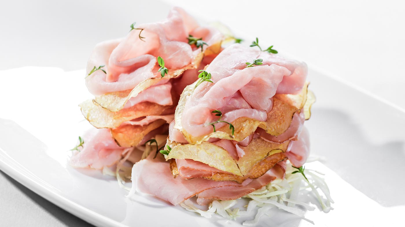 Gustose chips con prosciutto nel ristorante a Selva di Val Gardena